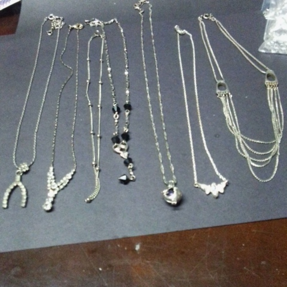 7 necklaces selling as a lot